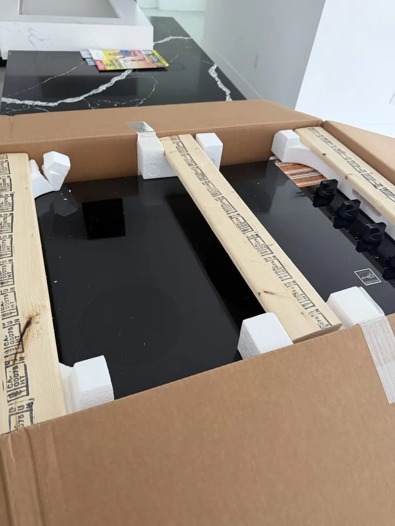 New cooktop in its shipping packaging