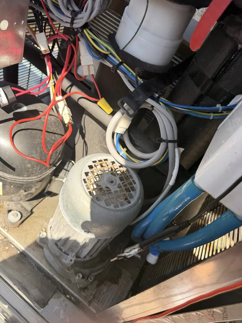 Motor, wiring and compressor inside the machine