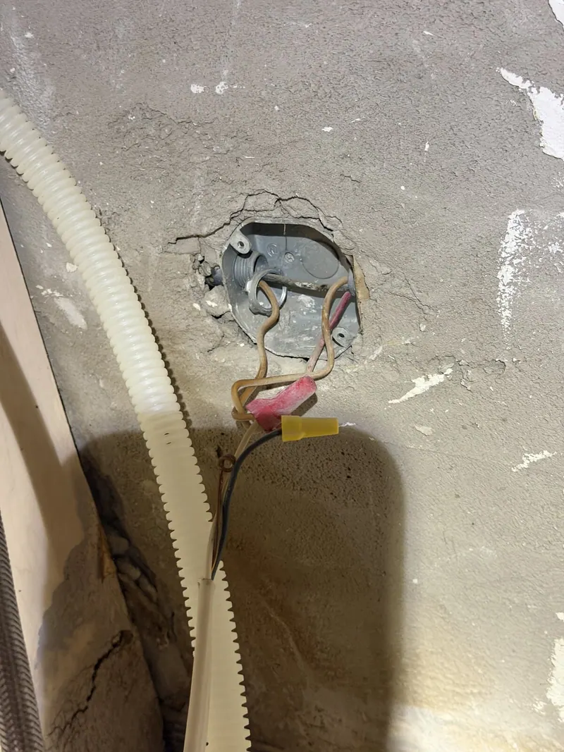 Wiring box behind the dishwasher