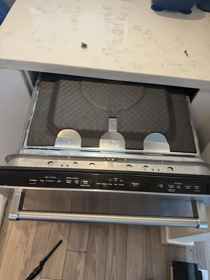 Dishwasher top with insulation padding