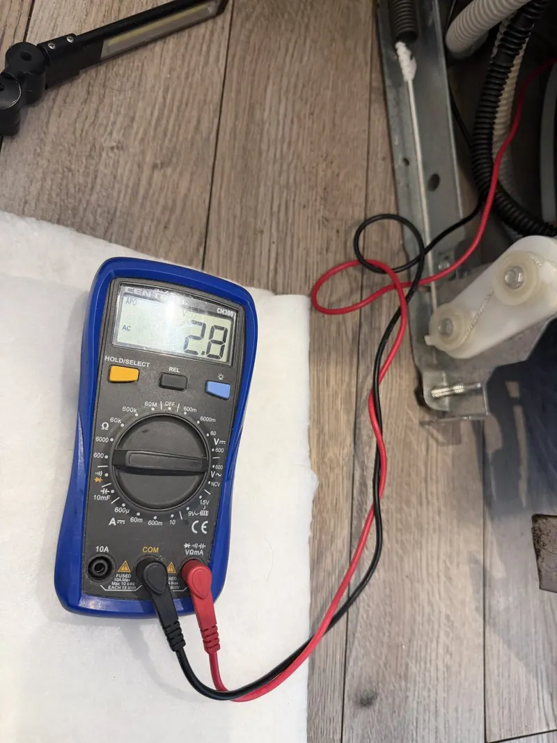 Multimeter testing a part