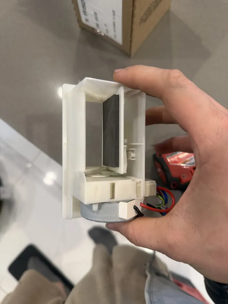 Refrigerator damper assembly in hand