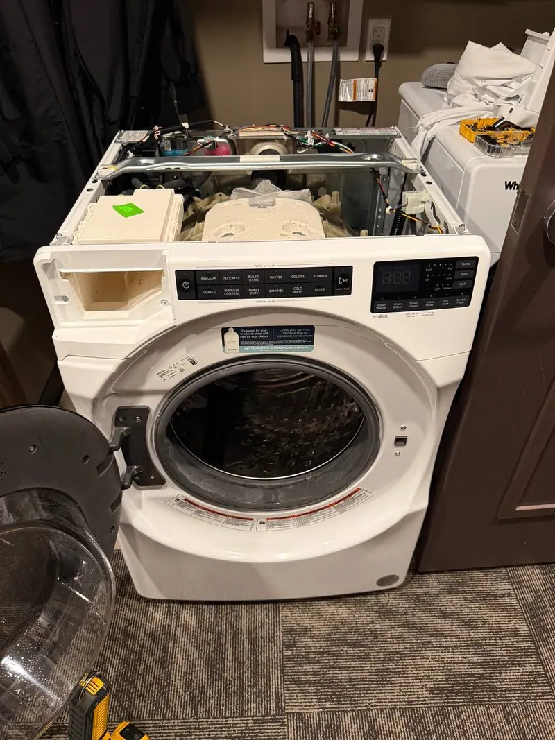 Front-load washer with the top panel and detergent drawer removed