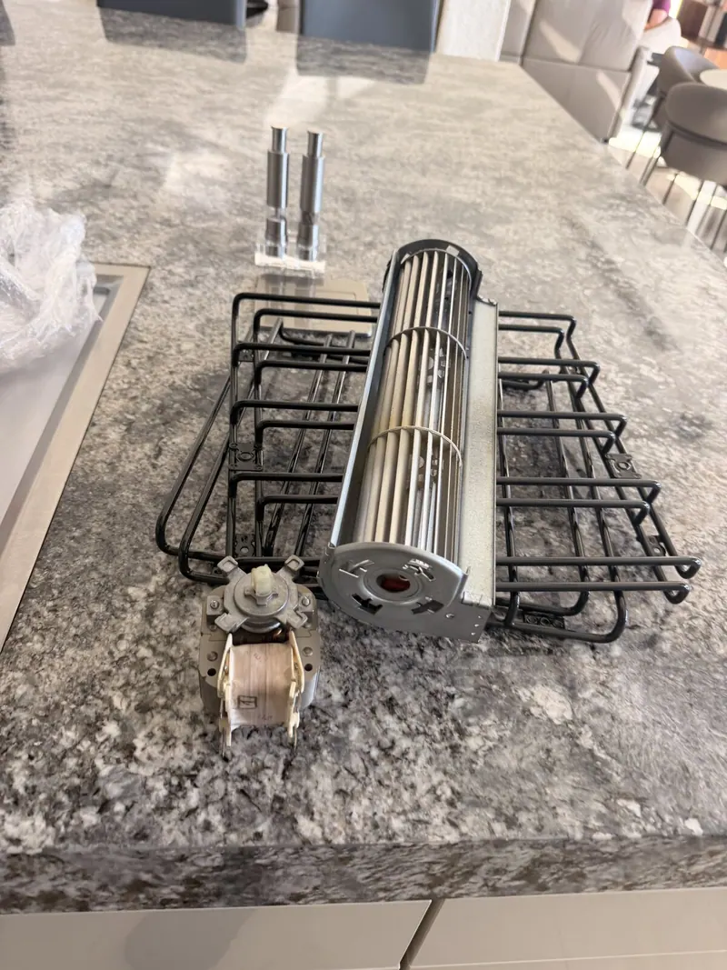 Oven cooling fan motor on the counter