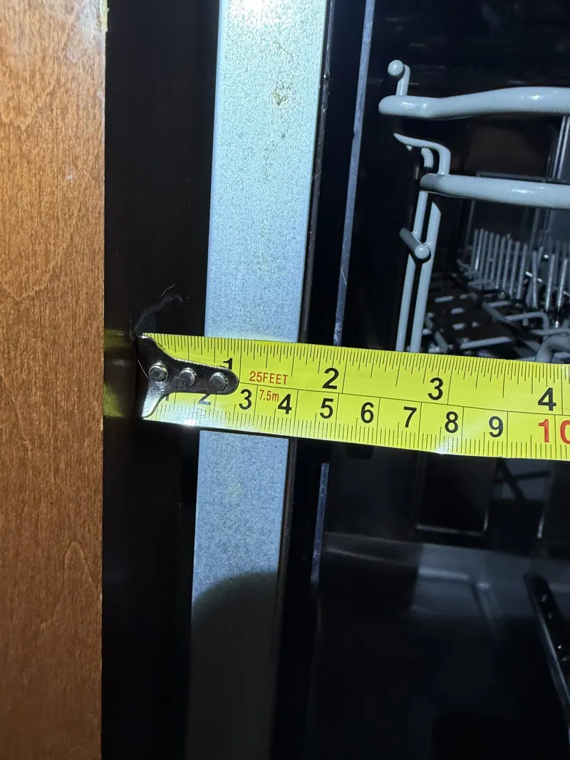 Measuring the side of the dishwasher door