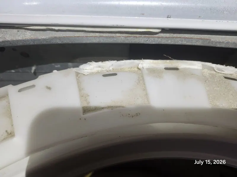 Close-up of a worn plastic part