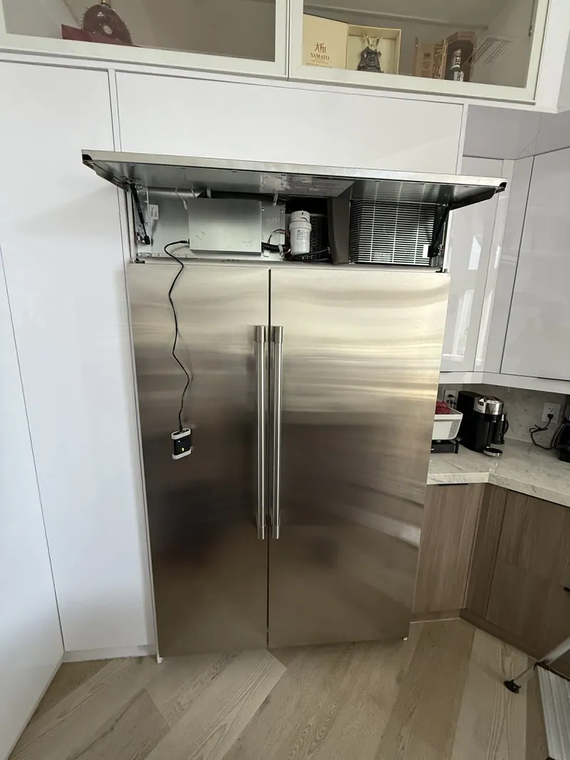 Monogram refrigerator with the top panel open