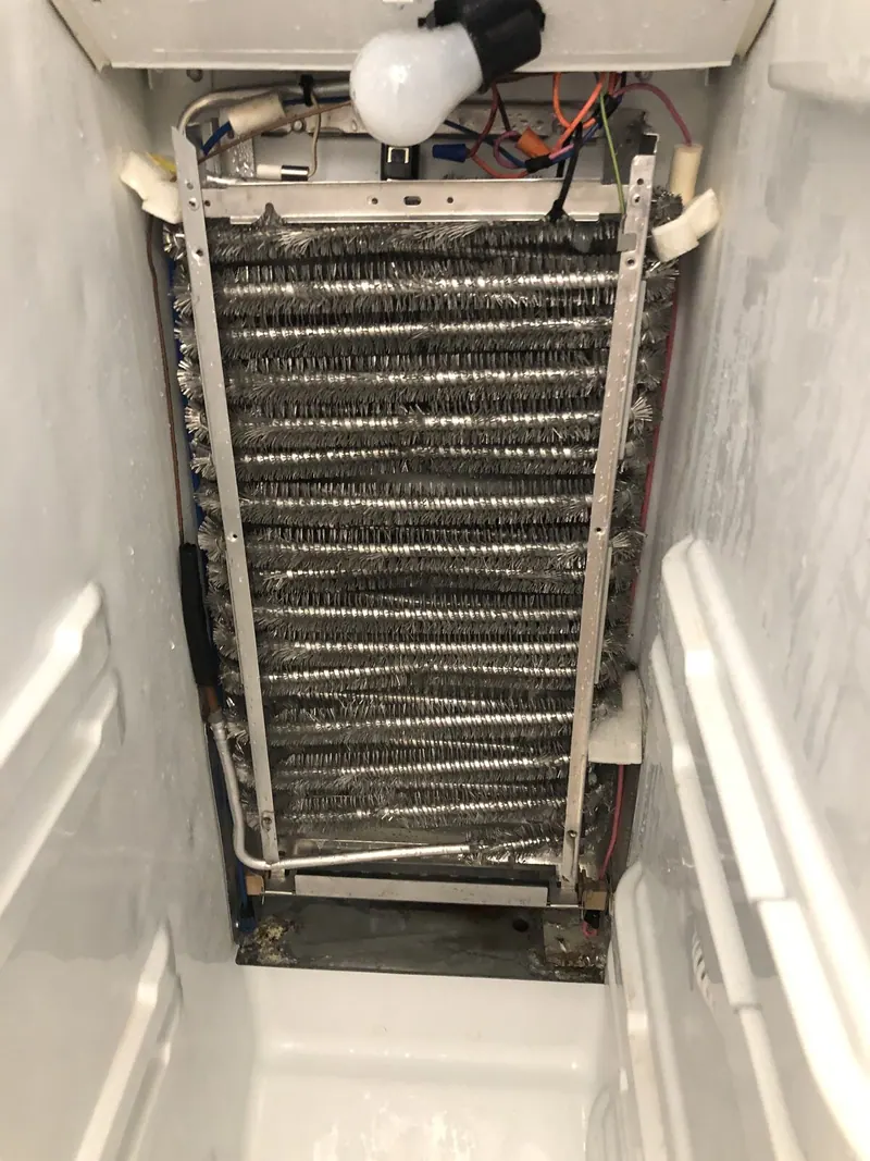Evaporator coils exposed in the freezer