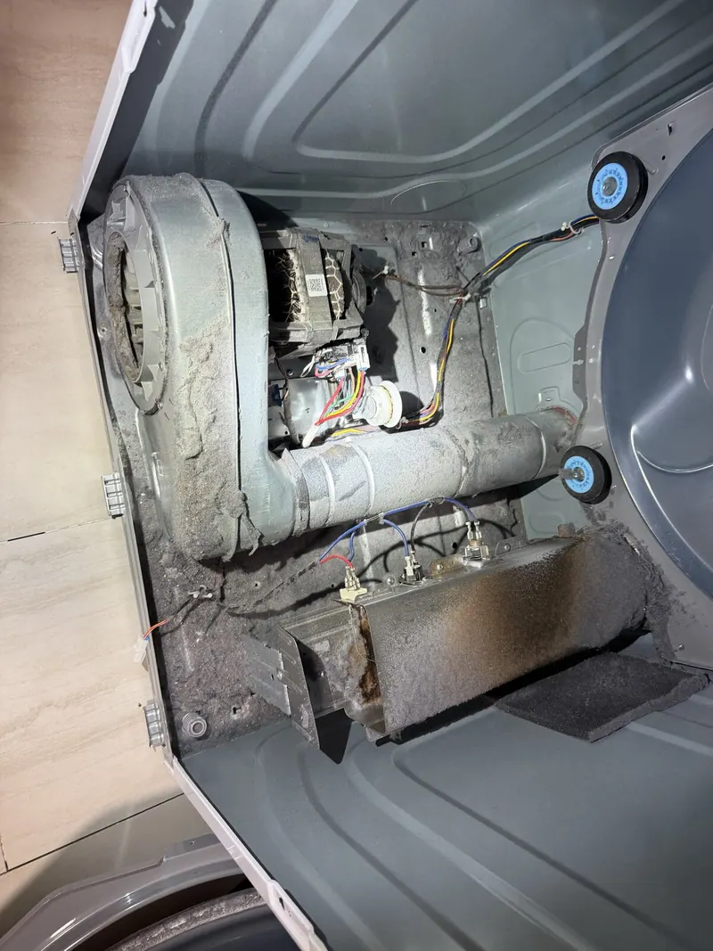 Lint on the dryer blower housing and heating element