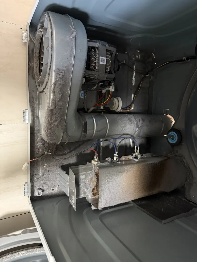 Blower housing and heating element assembly