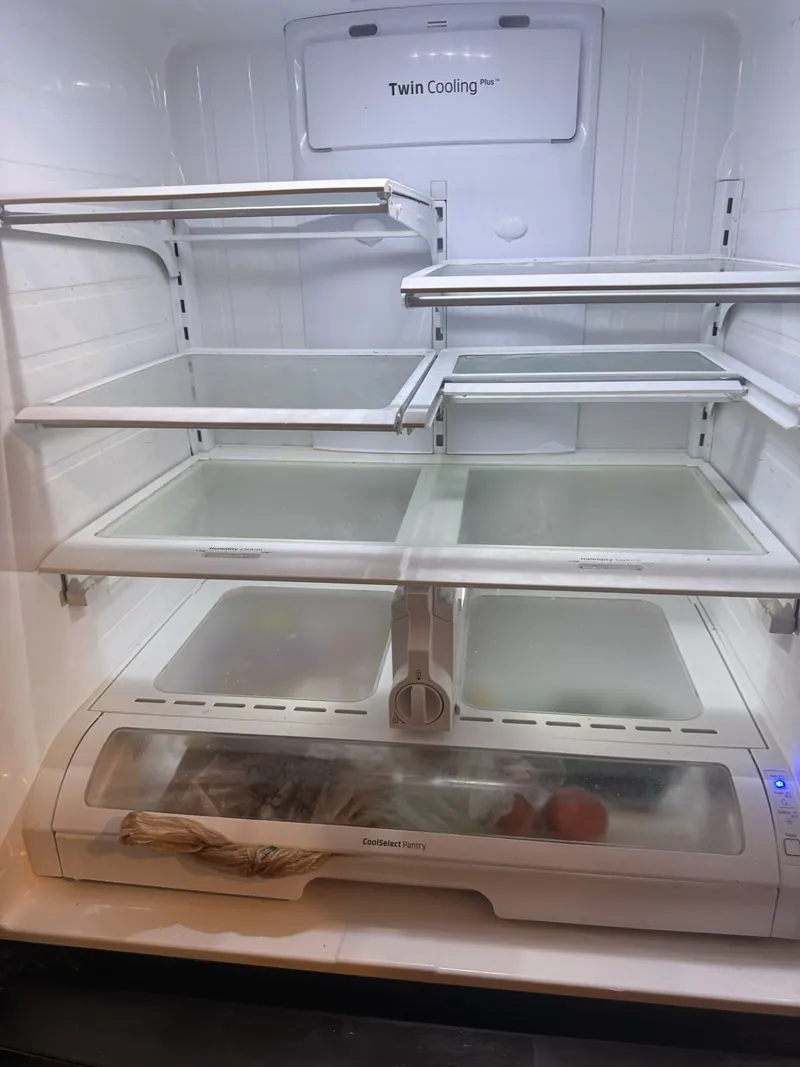 Samsung refrigerator interior with shelves and drawers