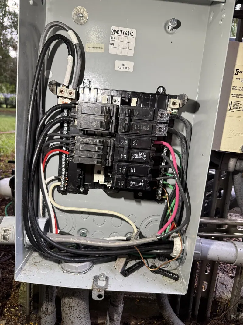 Open electrical panel with relays