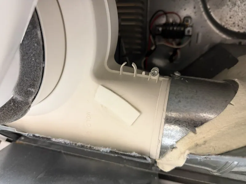 Blower housing and vent duct connection
