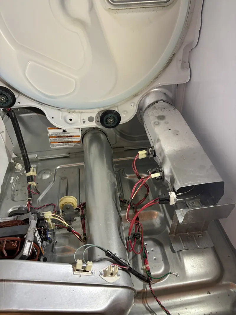 Heating element housing, motor and wiring inside the dryer