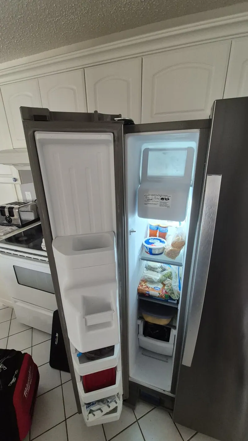 Whirlpool refrigerator with the freezer door open
