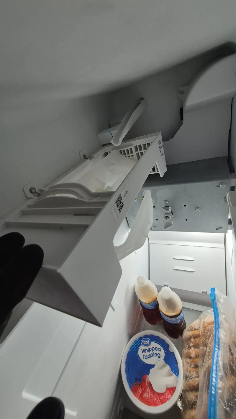 Ice maker assembly being fitted