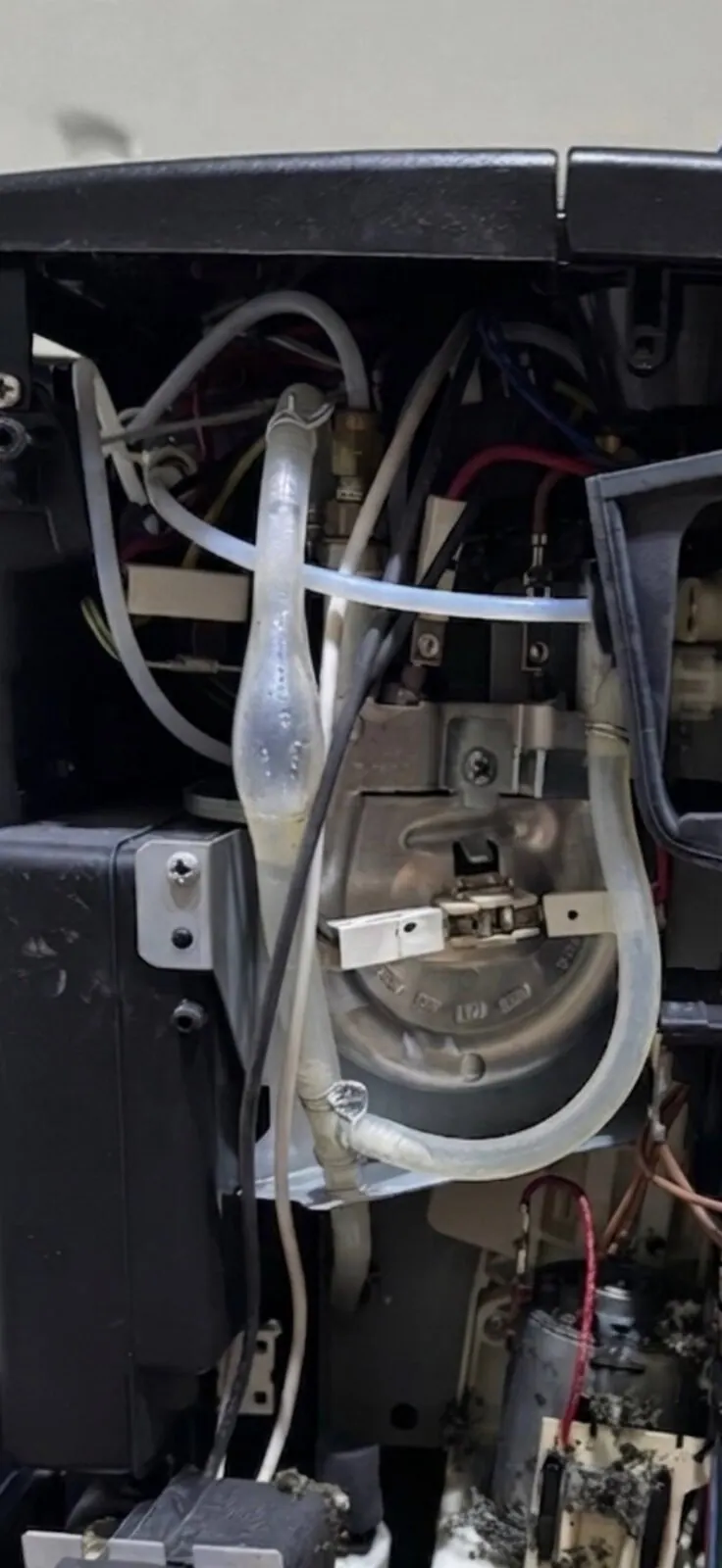 Inside the coffee machine: tubing and heating parts