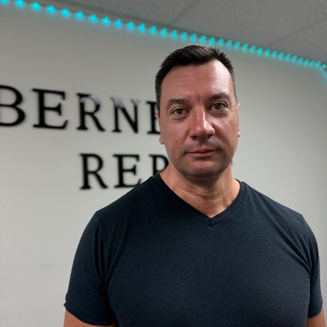 Dzmitrii Kitou, Berne Appliance Repair commercial-laundry technician, at the Berne Repair office