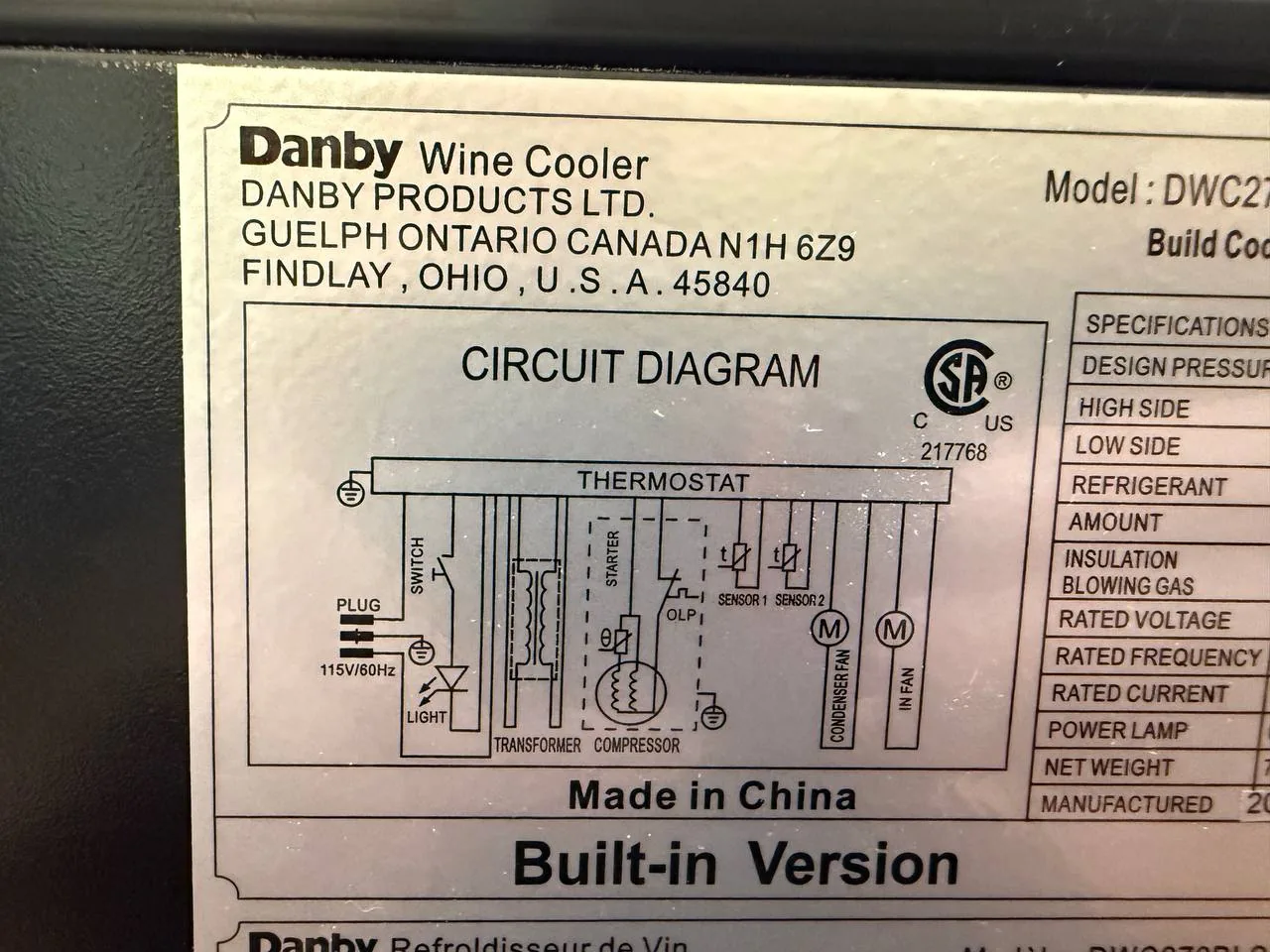 A close-up of a Danby Wine Cooler product label with a circuit diagram